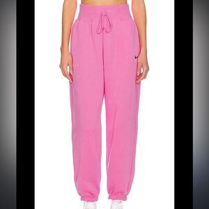 Nike High Waisted Phoenix Sweatpants in Playful Pink & Black | REVOLVE